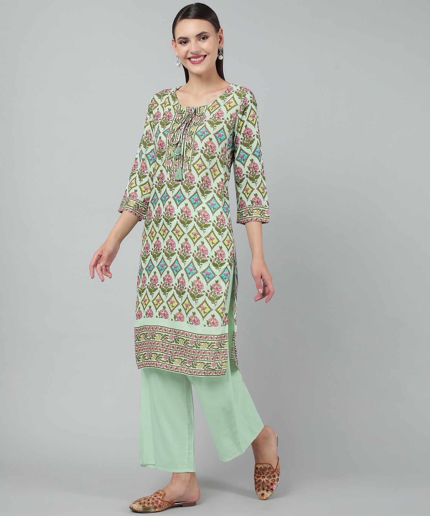Pritned Rayon Cotton Kurti with Keyhole Neck Tassels and Drawstring,Green